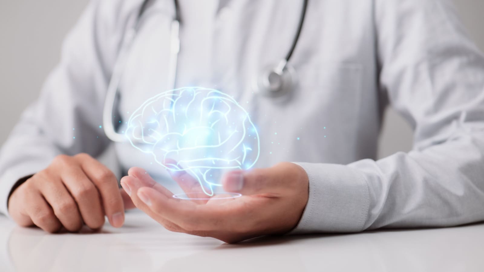 A doctor holding a human brain