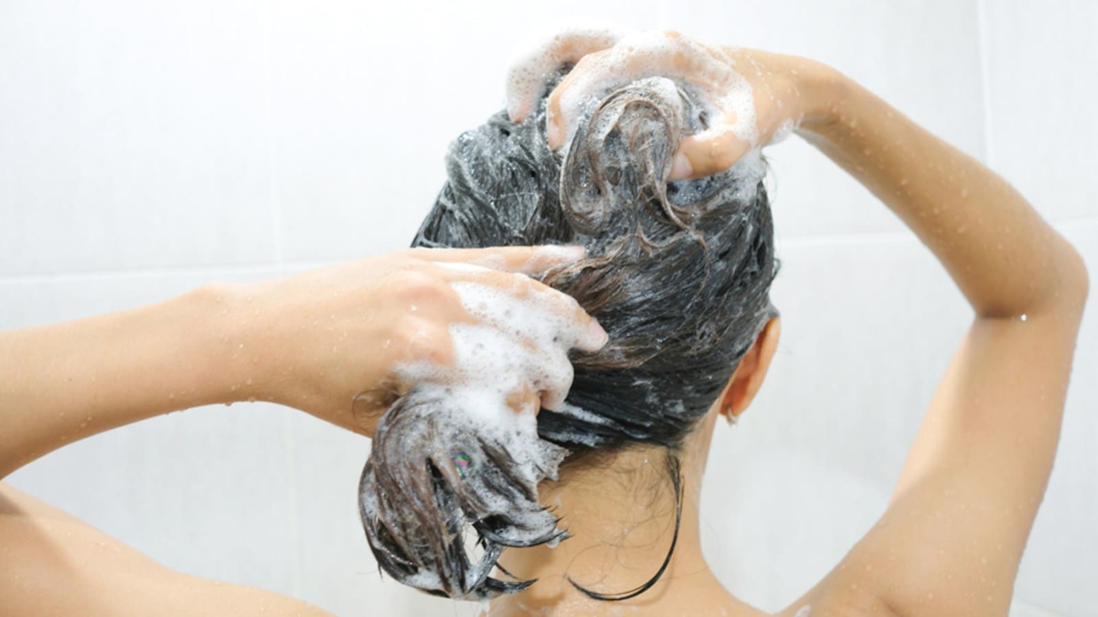 woman washing her hair